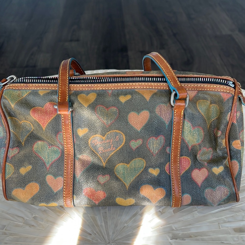 Dooney & Bourke heart purse in good condition